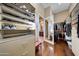 Large walk-in closet with ample shelving and hanging space at 24686 N 120Th Pl, Scottsdale, AZ 85255