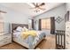 Comfortable bedroom with a king-size bed and neutral color scheme at 3780 S Ashley Pl, Chandler, AZ 85286