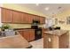 Kitchen with stainless steel appliances and an island at 3780 S Ashley Pl, Chandler, AZ 85286