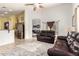 Bright living room with comfortable seating and kitchen views at 3780 S Ashley Pl, Chandler, AZ 85286