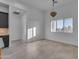 Bright dining room with large window and chandelier at 475 W Saddle Mountain Road --, Phoenix, AZ 85086