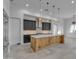 Modern kitchen with dark cabinetry and wood island at 475 W Saddle Mountain Road --, Phoenix, AZ 85086