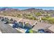 Aerial view of house and neighborhood with mountain backdrop at 5285 S Marble Dr, Gold Canyon, AZ 85118