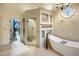 Spa-like bathroom with soaking tub and walk-in shower at 5317 N 46Th St, Phoenix, AZ 85018