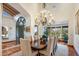 Formal dining room with a large table and access to the kitchen at 5317 N 46Th St, Phoenix, AZ 85018
