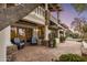 Stone patio with seating area and lovely landscaping at 5317 N 46Th St, Phoenix, AZ 85018