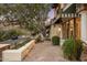 Landscaped patio area with flagstone and lighting at 5317 N 46Th St, Phoenix, AZ 85018