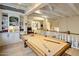 Game room with pool table and built-in shelving at 5317 N 46Th St, Phoenix, AZ 85018