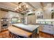 Gourmet kitchen with marble island and high-end appliances at 5317 N 46Th St, Phoenix, AZ 85018