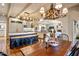 Spacious kitchen with an island, wooden beams, and views into the Gathering room at 5317 N 46Th St, Phoenix, AZ 85018