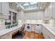 Bright laundry room with washer, dryer, and built-in cabinetry at 5317 N 46Th St, Phoenix, AZ 85018