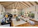 Spacious living room with fireplace and high ceilings at 5317 N 46Th St, Phoenix, AZ 85018