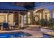 Beautiful pool with a stone patio and a large clock at 5317 N 46Th St, Phoenix, AZ 85018