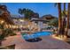 Large pool and spa with a flagstone patio and beautiful landscaping at 5317 N 46Th St, Phoenix, AZ 85018