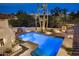 Luxury pool and spa at night with dramatic lighting and landscaping at 5317 N 46Th St, Phoenix, AZ 85018