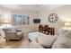 Relaxing sitting area featuring comfortable seating and a large window at 5317 N 46Th St, Phoenix, AZ 85018