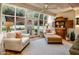 Sunroom with access to the backyard and comfortable seating at 5317 N 46Th St, Phoenix, AZ 85018