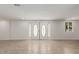 Bright entryway with double doors and tile floors at 6306 W Mitchell Dr, Phoenix, AZ 85033