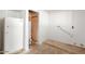 Laundry area with washer, dryer hookups, and extra storage at 6306 W Mitchell Dr, Phoenix, AZ 85033