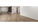 Spacious living room with tile floors and lots of natural light at 6306 W Mitchell Dr, Phoenix, AZ 85033