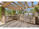 Stainless steel outdoor kitchen with pergola cover at 6322 E Turquoise Ave, Paradise Valley, AZ 85253