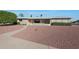 Ranch style home with landscaped yard and walkway at 663 N 63Rd Pl, Mesa, AZ 85205