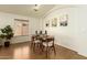 Elegant dining area with a wood table and four modern chairs at 915 W Spur Ave, Gilbert, AZ 85233