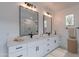 Clean bathroom with double vanity and modern fixtures at 943 N 97Th Way, Mesa, AZ 85207