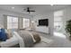 Main bedroom with ensuite bath and plenty of natural light at 943 N 97Th Way, Mesa, AZ 85207