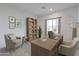 Home office with built-in shelving and plenty of workspace at 943 N 97Th Way, Mesa, AZ 85207