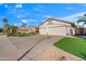 Two-car garage and artificial turf lawn at 9620 W Ruth Ave, Peoria, AZ 85345