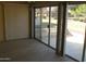 Sliding glass doors open to a spacious patio area at 10334 W Highwood Ln, Sun City, AZ 85373