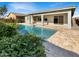 Inviting swimming pool with large patio and plenty of space for relaxation at 14139 W Gray Fox Trl, Surprise, AZ 85387