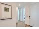 Bright and airy entryway with tile floors and modern decor at 15875 W Kendall St, Goodyear, AZ 85338