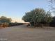 Gravel driveway and mature trees in front yard at 2687 E Caitlin Way, San Tan Valley, AZ 85140