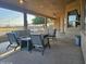 Covered patio with seating area and mountain views at 2687 E Caitlin Way, San Tan Valley, AZ 85140