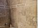 Shower with tile surround and neutral tones at 2687 E Caitlin Way, San Tan Valley, AZ 85140