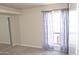 Simple bedroom with carpeted floor and window at 3434 W Danbury Dr # A204, Phoenix, AZ 85053