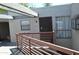 Condominium building exterior with balcony and door at 3434 W Danbury Dr # A204, Phoenix, AZ 85053