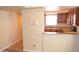 Kitchen with granite countertops and wooden cabinets at 3434 W Danbury Dr # A204, Phoenix, AZ 85053