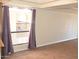 Spacious living room with large window and curtains at 3434 W Danbury Dr # A204, Phoenix, AZ 85053