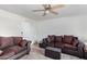 Living room with two couches and a ceiling fan at 3601 W Tierra Buena Ln # 248, Phoenix, AZ 85053