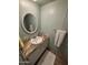 Bathroom features a vanity with granite countertop and a large mirror at 4065 E University Dr # 276, Mesa, AZ 85205