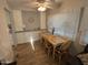 Charming dining area with wood table and chairs, near kitchen at 4065 E University Dr # 276, Mesa, AZ 85205