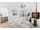 Main bedroom with a king-size bed, ceiling fan, and ensuite bathroom at 4220 N 32Nd St # 3, Phoenix, AZ 85018