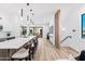 Modern kitchen features a large island with seating and opens to the living area at 4220 N 32Nd St # 3, Phoenix, AZ 85018