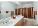 Bathroom with double sinks, shower/tub combo, and tile flooring at 4935 E Dale Ln, Cave Creek, AZ 85331