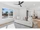 Living room with a sofa and view into the dining area at 5030 E Winchcomb Dr, Scottsdale, AZ 85254