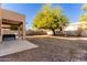 Spacious backyard with covered patio and seating area at 664 W Viola St, Casa Grande, AZ 85122