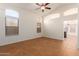 Bright living room with tile floors and vaulted ceilings at 8359 W Melinda Ln, Peoria, AZ 85382